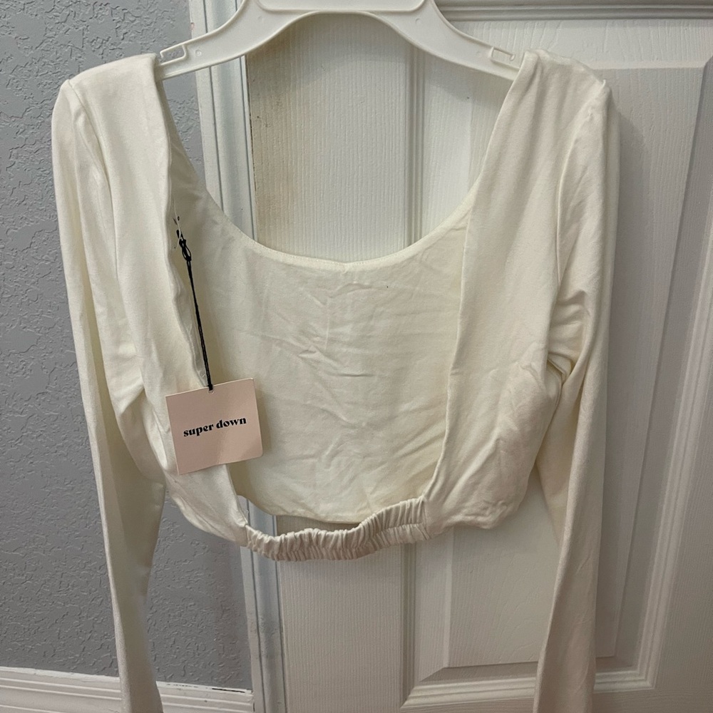 Never worn open back white long sleeve top